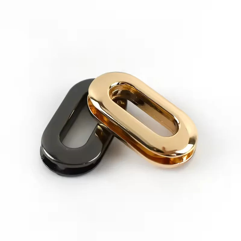 Factory Supply Custom Brass Oval Shaped Metal Eyelets Garment Grommet Oval Eyelet Handbag Alloy Eyelets Buckle
